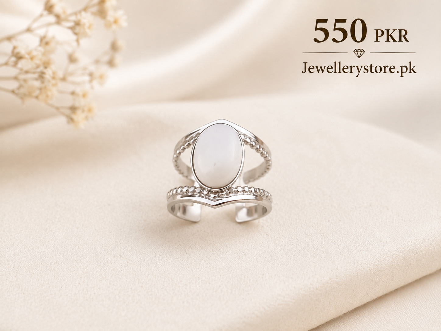 white stone silver ring